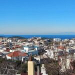 Panoramic daytime view over Embonas village in Rhodes Greece with sea horizon