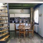 Modern kitchen and dining area inside Apartment Smaro at Rustic House Embonas Rhodes